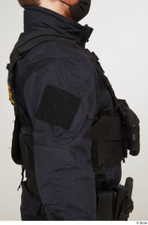 Photos Michael Summers Cop bulletproof vest detail of uniform upper…